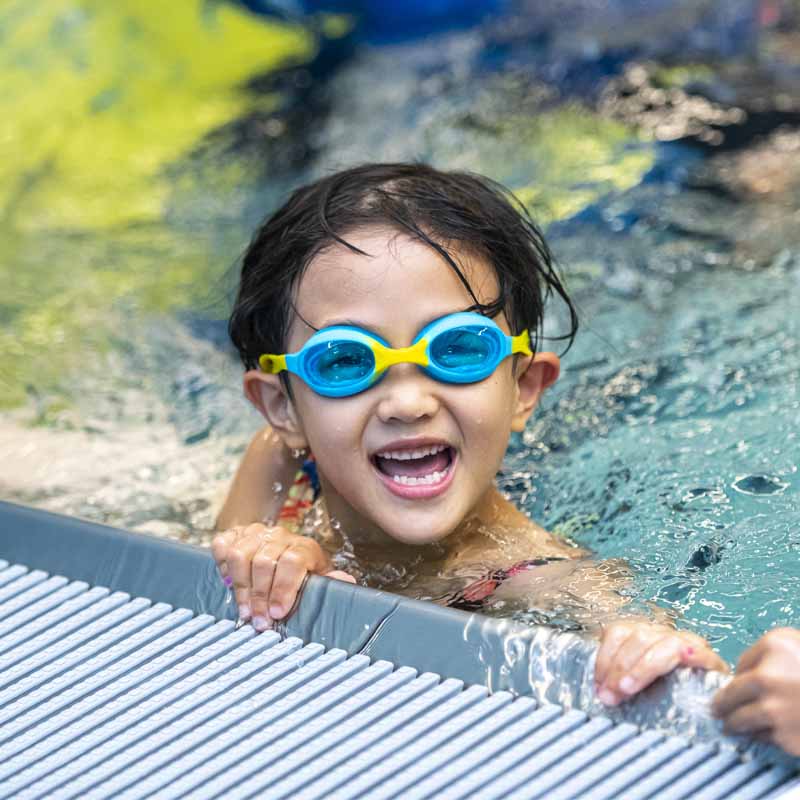 Close up of girl swimming